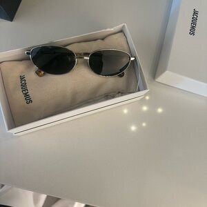 Jacquemus Silver Oval Sunglasses with Dark Lenses